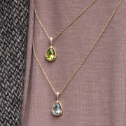 Collier pendentif classique en or jaune 9 carats avec péridot et diamant