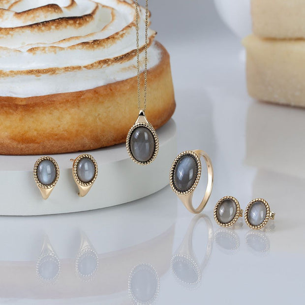 Bague classique en or jaune 9 carats avec pierre de lune noire ovale